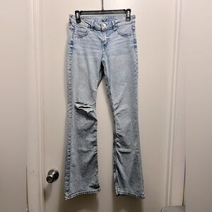 Low Rise Boot Cut Light Blue Distressed Women's Jeans, Size 4